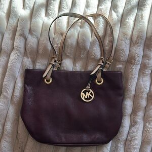 Michael Kors burgundy and tan purse